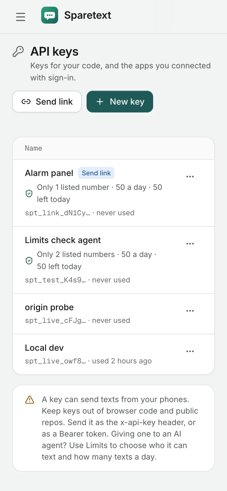 The API keys page on a phone: a send link and an agent key, each limited to listed numbers and 50 texts a day with 50 left today, two keys with no limits, and a warning to keep keys out of browser code and public repos.